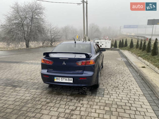 Синий Мицубиси Лансер, объемом двигателя 2 л и пробегом 230 тыс. км за 6500 $, фото 4 на Automoto.ua