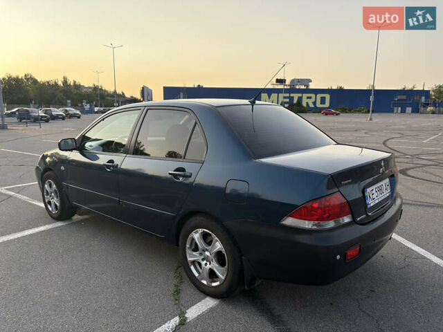 Синій Міцубісі Lancer, об'ємом двигуна 1.58 л та пробігом 167 тис. км за 5700 $, фото 4 на Automoto.ua