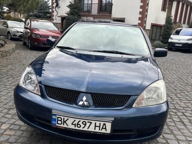 Міцубісі Lancer 2008 у Рівному на Automoto.ua Синій Міцубісі Lancer, об'ємом двигуна 1.6 л та пробігом 158 тис. км за 3900 $, фото 17 на Automoto.ua