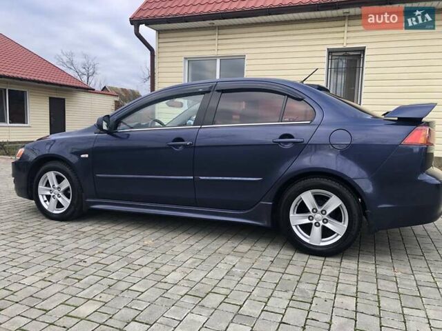 Синий Мицубиси Лансер, объемом двигателя 1.5 л и пробегом 263 тыс. км за 6700 $, фото 8 на Automoto.ua