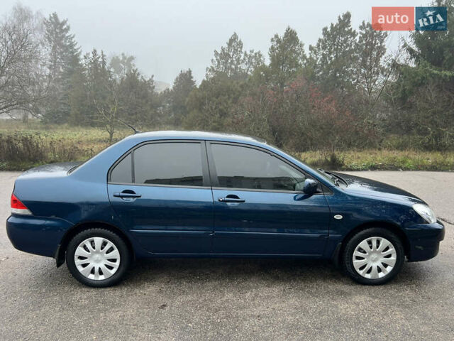 Синий Мицубиси Лансер, объемом двигателя 1.59 л и пробегом 126 тыс. км за 5950 $, фото 7 на Automoto.ua