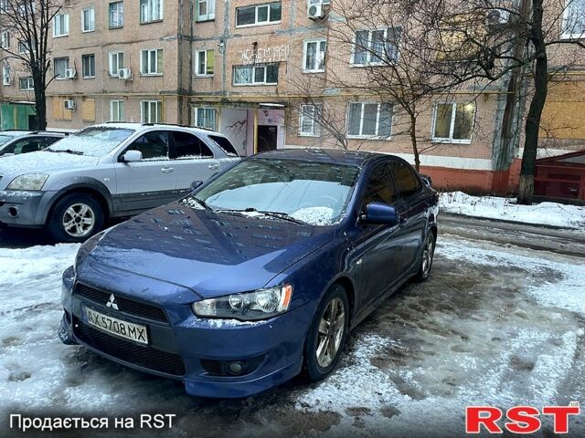 Синій Міцубісі Lancer, об'ємом двигуна 2 л та пробігом 215 тис. км за 6500 $, фото 4 на Automoto.ua