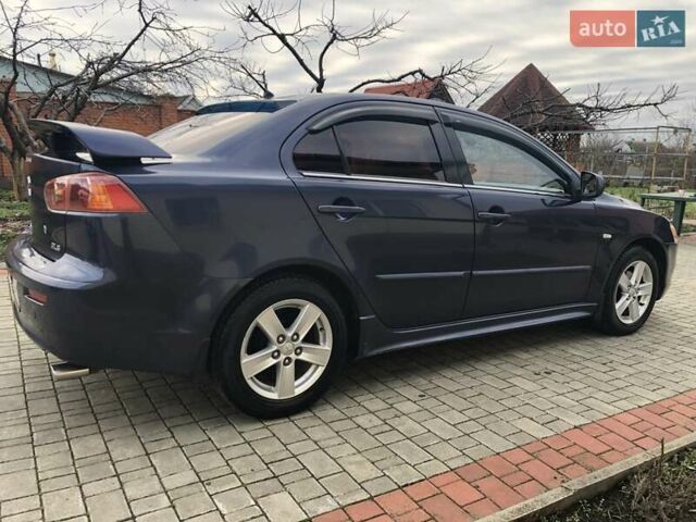 Синий Мицубиси Лансер, объемом двигателя 1.5 л и пробегом 263 тыс. км за 6700 $, фото 2 на Automoto.ua