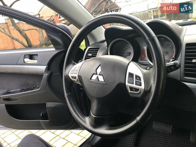 Синий Мицубиси Лансер, объемом двигателя 1.5 л и пробегом 263 тыс. км за 6700 $, фото 35 на Automoto.ua