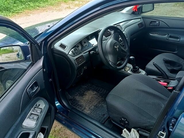 Міцубісі Lancer 2008 у Харкові на Automoto.ua Синій Міцубісі Lancer, об'ємом двигуна 1.6 л та пробігом 210 тис. км за 3700 $, фото 5 на Automoto.ua