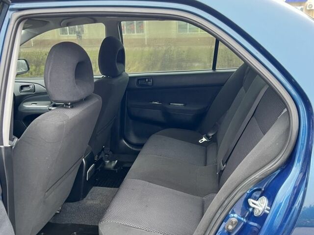 Синій Міцубісі Lancer, об'ємом двигуна 1.6 л та пробігом 126 тис. км за 5950 $, фото 12 на Automoto.ua