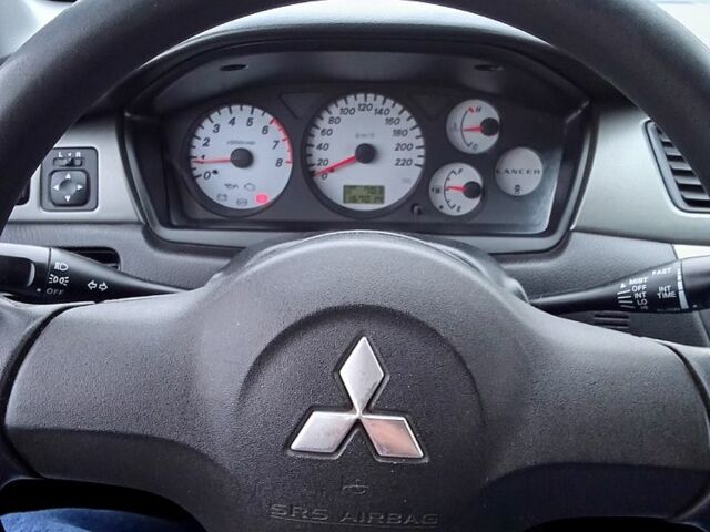 Синій Міцубісі Lancer, об'ємом двигуна 1.6 л та пробігом 167 тис. км за 4700 $, фото 11 на Automoto.ua