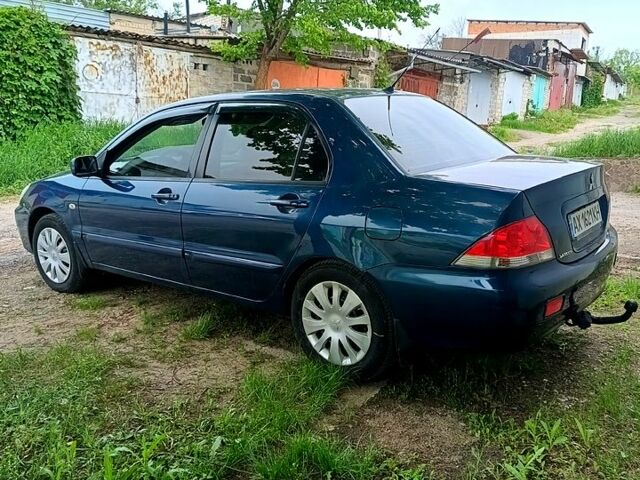 Міцубісі Lancer 2008 у Харкові на Automoto.ua Синій Міцубісі Lancer, об'ємом двигуна 1.6 л та пробігом 210 тис. км за 3700 $, фото 6 на Automoto.ua