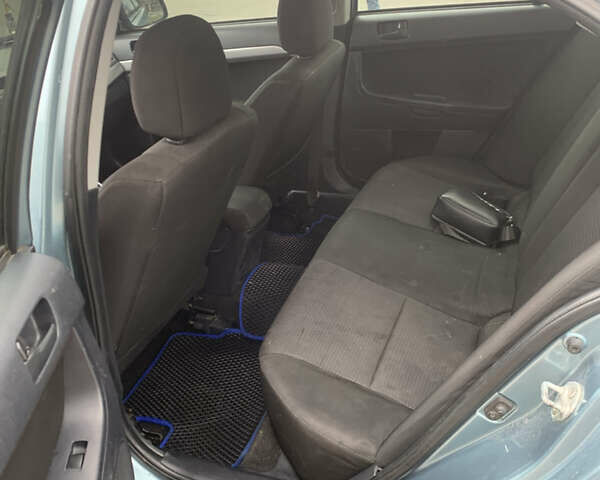 Синій Міцубісі Lancer, об'ємом двигуна 1.5 л та пробігом 250 тис. км за 4700 $, фото 7 на Automoto.ua