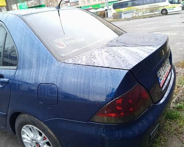 Синій Міцубісі Lancer, об'ємом двигуна 1.6 л та пробігом 206 тис. км за 5500 $, фото 7 на Automoto.ua
