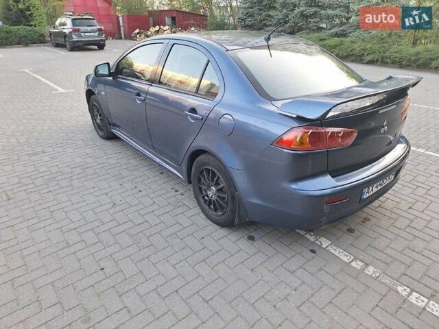 Синий Мицубиси Лансер, объемом двигателя 1.5 л и пробегом 250 тыс. км за 4000 $, фото 5 на Automoto.ua