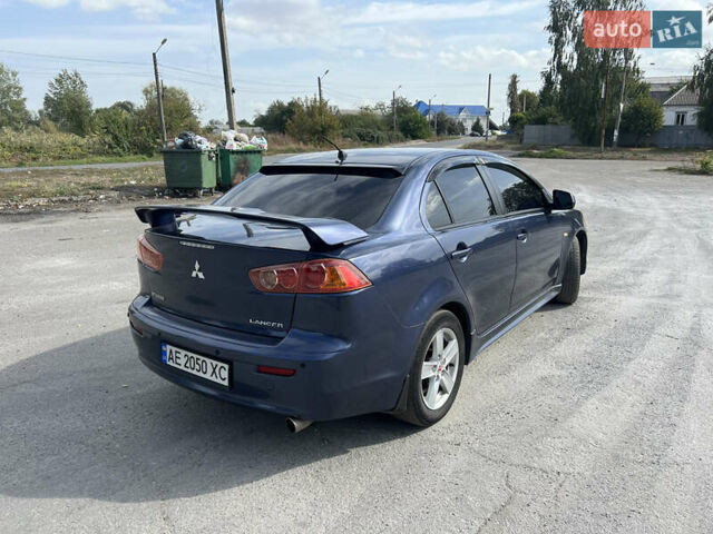 Синий Мицубиси Лансер, объемом двигателя 2 л и пробегом 248 тыс. км за 6600 $, фото 7 на Automoto.ua