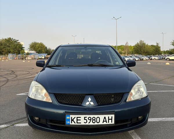 Синій Міцубісі Lancer, об'ємом двигуна 1.58 л та пробігом 167 тис. км за 5700 $, фото 1 на Automoto.ua