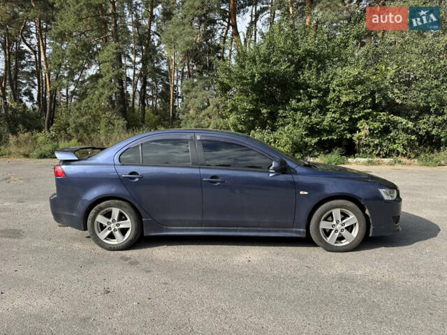 Синій Міцубісі Lancer, об'ємом двигуна 2 л та пробігом 299 тис. км за 7100 $, фото 5 на Automoto.ua