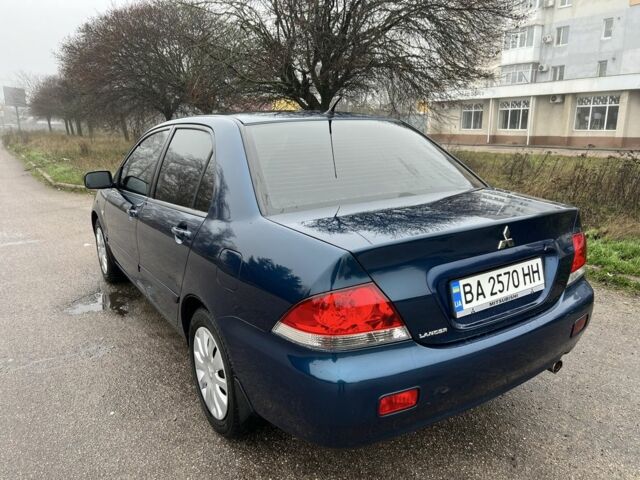 Синій Міцубісі Lancer, об'ємом двигуна 1.6 л та пробігом 126 тис. км за 5950 $, фото 4 на Automoto.ua