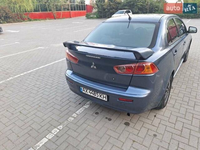 Синий Мицубиси Лансер, объемом двигателя 1.5 л и пробегом 250 тыс. км за 4000 $, фото 4 на Automoto.ua