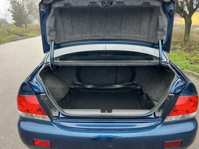 Синій Міцубісі Lancer, об'ємом двигуна 1.6 л та пробігом 126 тис. км за 5950 $, фото 13 на Automoto.ua