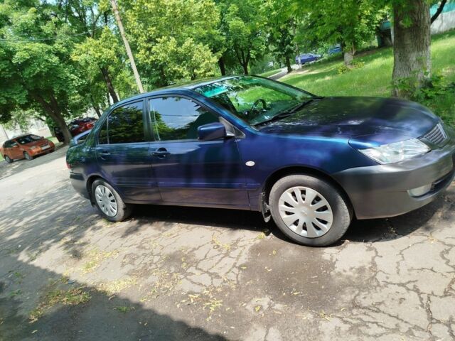 Мицубиси Лансер 2008 в Белой Церкве на Automoto.ua Синий Мицубиси Лансер, объемом двигателя 1.6 л и пробегом 243 тыс. км за 4200 $, фото 5 на Automoto.ua