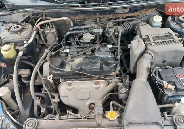 Синій Міцубісі Lancer, об'ємом двигуна 1.58 л та пробігом 220 тис. км за 4200 $, фото 11 на Automoto.ua