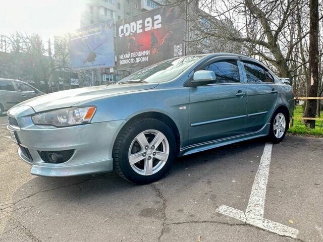 Синий Мицубиси Лансер, объемом двигателя 1.5 л и пробегом 250 тыс. км за 5150 $, фото 5 на Automoto.ua