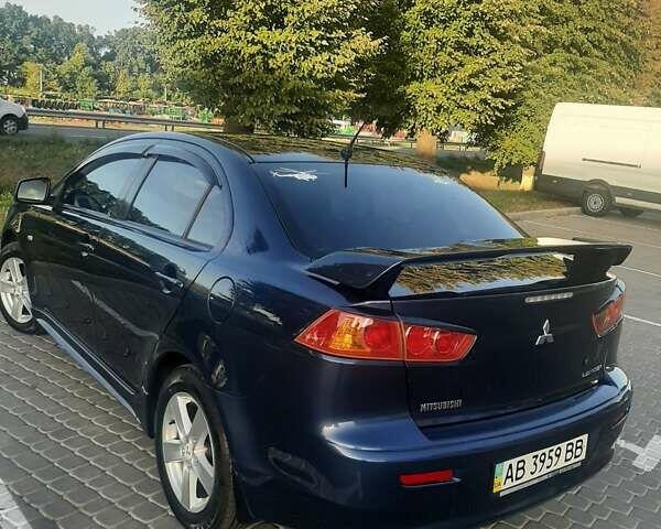 Синий Мицубиси Лансер, объемом двигателя 2 л и пробегом 142 тыс. км за 8000 $, фото 2 на Automoto.ua