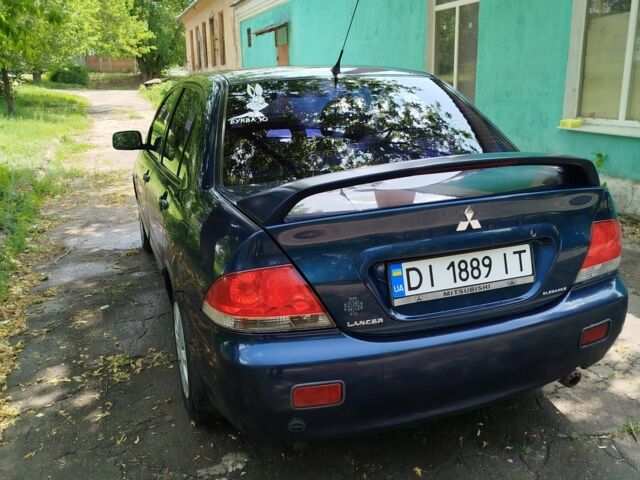 Мицубиси Лансер 2008 в Белой Церкве на Automoto.ua Синий Мицубиси Лансер, объемом двигателя 1.6 л и пробегом 243 тыс. км за 4200 $, фото 8 на Automoto.ua