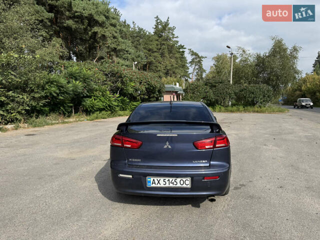 Синій Міцубісі Lancer, об'ємом двигуна 2 л та пробігом 299 тис. км за 7100 $, фото 3 на Automoto.ua