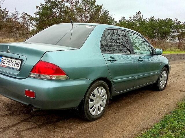 Синій Міцубісі Lancer, об'ємом двигуна 1.6 л та пробігом 167 тис. км за 4700 $, фото 4 на Automoto.ua