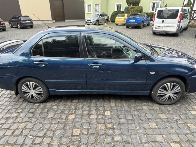 Міцубісі Lancer 2008 у Рівному на Automoto.ua Синій Міцубісі Lancer, об'ємом двигуна 1.6 л та пробігом 158 тис. км за 3900 $, фото 4 на Automoto.ua