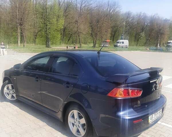 Синій Міцубісі Lancer, об'ємом двигуна 2 л та пробігом 142 тис. км за 8200 $, фото 4 на Automoto.ua