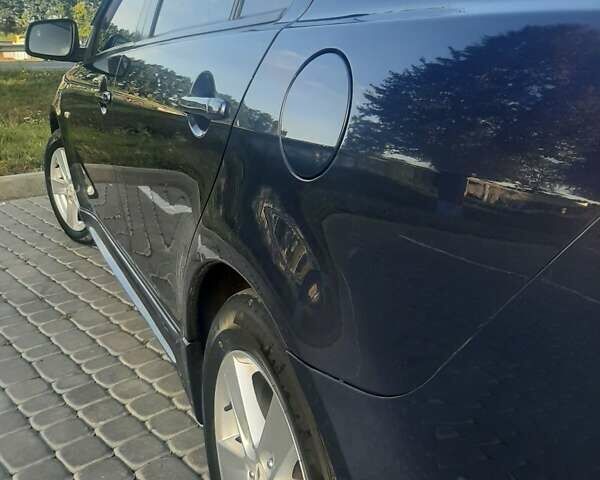 Синий Мицубиси Лансер, объемом двигателя 2 л и пробегом 142 тыс. км за 8000 $, фото 3 на Automoto.ua