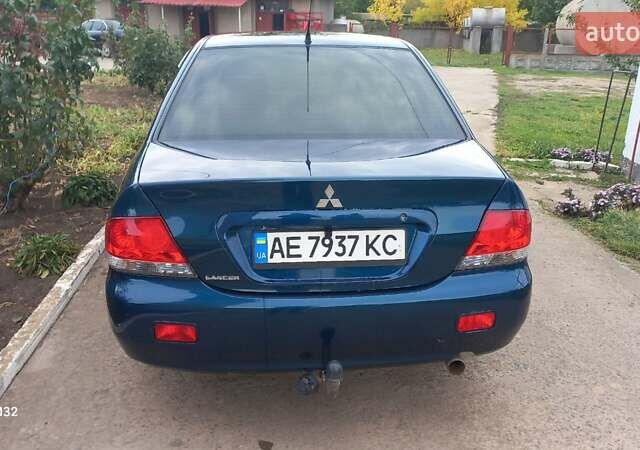 Синій Міцубісі Lancer, об'ємом двигуна 1.58 л та пробігом 220 тис. км за 4200 $, фото 4 на Automoto.ua
