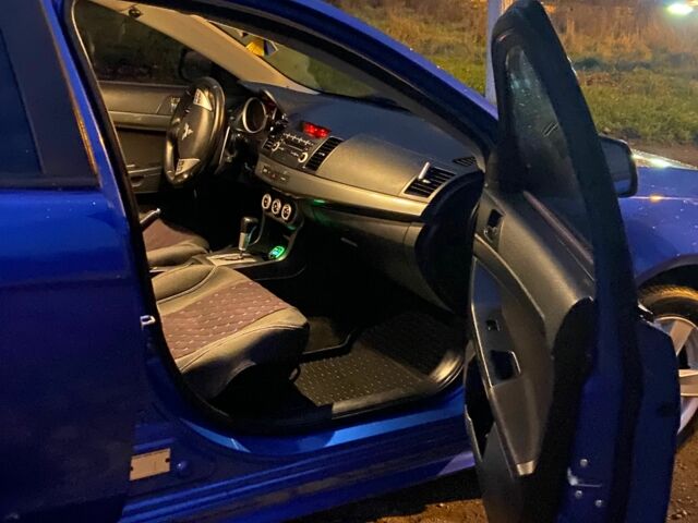 Синий Мицубиси Лансер, объемом двигателя 2 л и пробегом 176 тыс. км за 5300 $, фото 7 на Automoto.ua