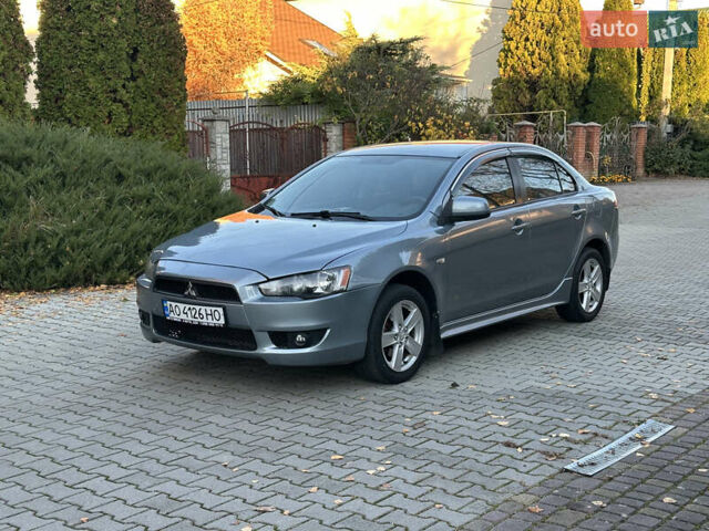 Синий Мицубиси Лансер, объемом двигателя 2 л и пробегом 320 тыс. км за 4999 $, фото 2 на Automoto.ua