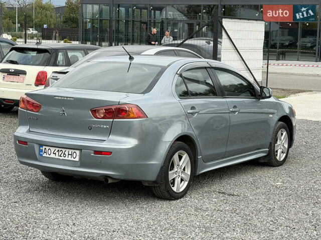 Міцубісі Lancer 2009 у Ужгороді на Automoto.ua Синій Міцубісі Lancer, об'ємом двигуна 2 л та пробігом 320 тис. км за 4999 $, фото 3 на Automoto.ua