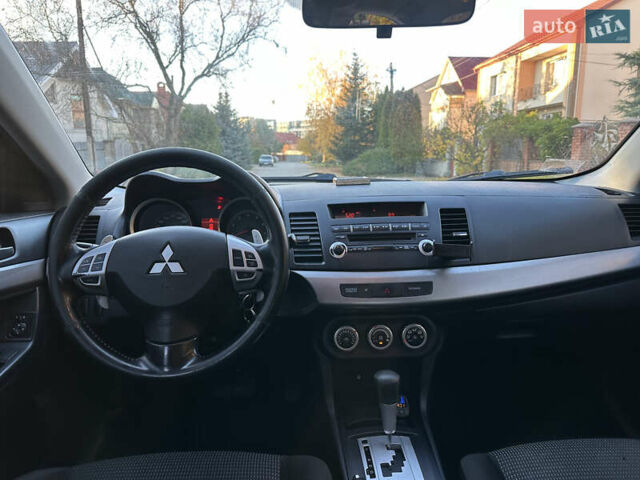 Синий Мицубиси Лансер, объемом двигателя 2 л и пробегом 320 тыс. км за 4999 $, фото 6 на Automoto.ua