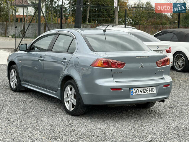 Міцубісі Lancer 2009 у Ужгороді на Automoto.ua Синій Міцубісі Lancer, об'ємом двигуна 2 л та пробігом 320 тис. км за 4999 $, фото 4 на Automoto.ua