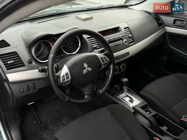 Синий Мицубиси Лансер, объемом двигателя 2 л и пробегом 320 тыс. км за 4900 $, фото 8 на Automoto.ua