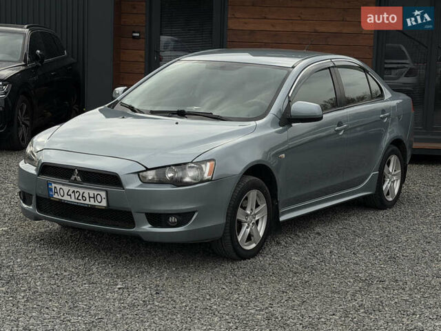 Синий Мицубиси Лансер, объемом двигателя 2 л и пробегом 320 тыс. км за 4900 $, фото 1 на Automoto.ua