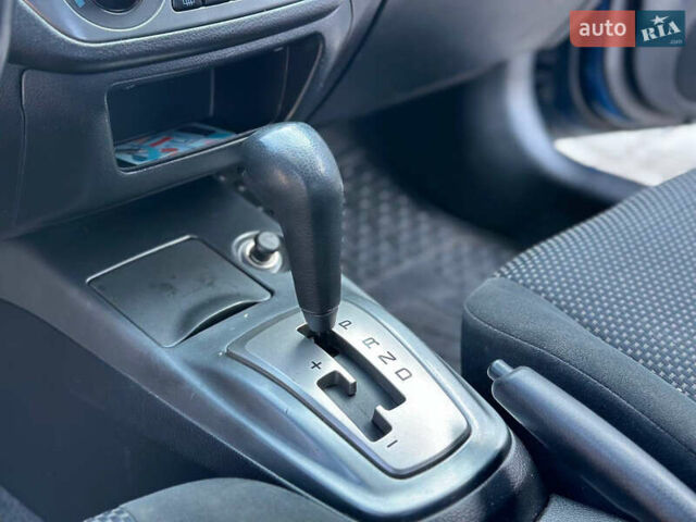 Синій Міцубісі Lancer, об'ємом двигуна 1.6 л та пробігом 250 тис. км за 5499 $, фото 19 на Automoto.ua