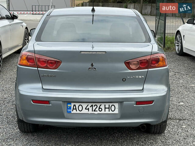 Міцубісі Lancer 2009 у Ужгороді на Automoto.ua Синій Міцубісі Lancer, об'ємом двигуна 2 л та пробігом 320 тис. км за 4999 $, фото 5 на Automoto.ua