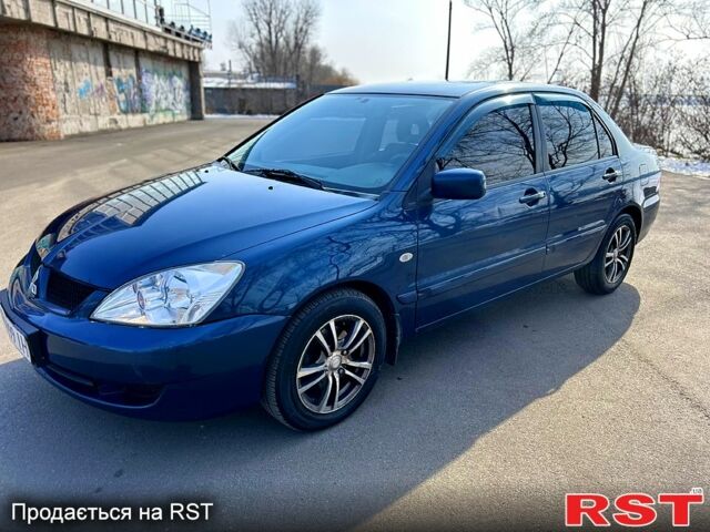 Мицубиси Лансер 2009 в Днепре (Днепропетровске) на Automoto.ua Синий Мицубиси Лансер, объемом двигателя 1.6 л и пробегом 250 тыс. км за 4999 $, фото 3 на Automoto.ua