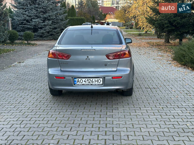 Синий Мицубиси Лансер, объемом двигателя 2 л и пробегом 320 тыс. км за 4999 $, фото 4 на Automoto.ua