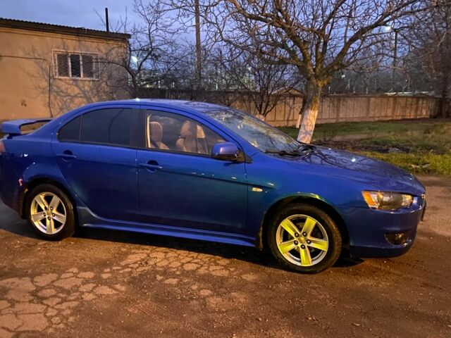 Синий Мицубиси Лансер, объемом двигателя 2 л и пробегом 176 тыс. км за 5300 $, фото 3 на Automoto.ua
