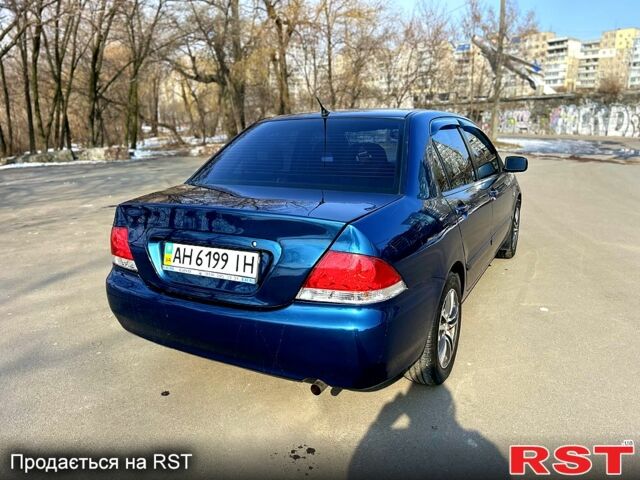 Мицубиси Лансер 2009 в Днепре (Днепропетровске) на Automoto.ua Синий Мицубиси Лансер, объемом двигателя 1.6 л и пробегом 250 тыс. км за 4999 $, фото 4 на Automoto.ua