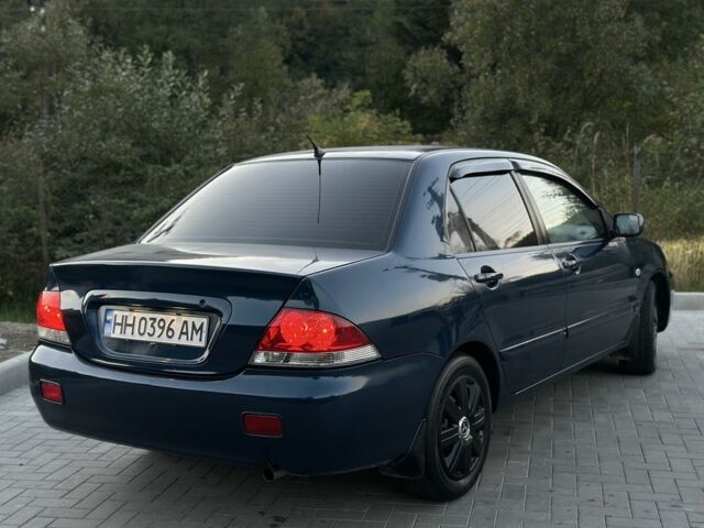 Синий Мицубиси Лансер, объемом двигателя 1.6 л и пробегом 138 тыс. км за 4800 $, фото 8 на Automoto.ua