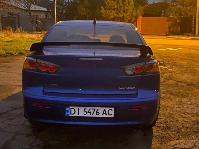 Синий Мицубиси Лансер, объемом двигателя 2 л и пробегом 176 тыс. км за 5300 $, фото 4 на Automoto.ua
