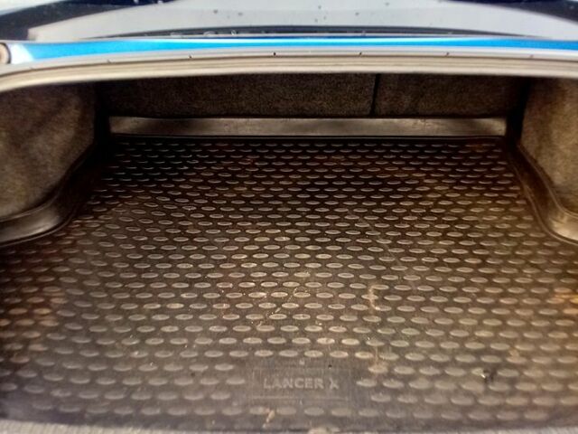 Синій Міцубісі Lancer, об'ємом двигуна 2 л та пробігом 230 тис. км за 8700 $, фото 9 на Automoto.ua