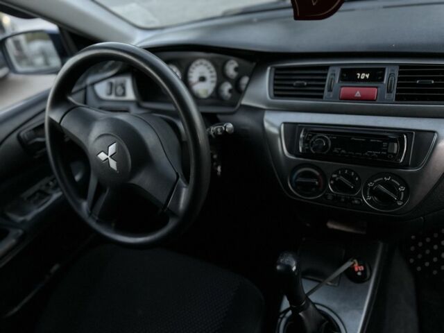 Синий Мицубиси Лансер, объемом двигателя 1.6 л и пробегом 138 тыс. км за 4800 $, фото 16 на Automoto.ua