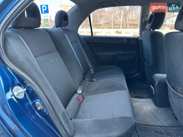 Синій Міцубісі Lancer, об'ємом двигуна 1.6 л та пробігом 250 тис. км за 5499 $, фото 21 на Automoto.ua